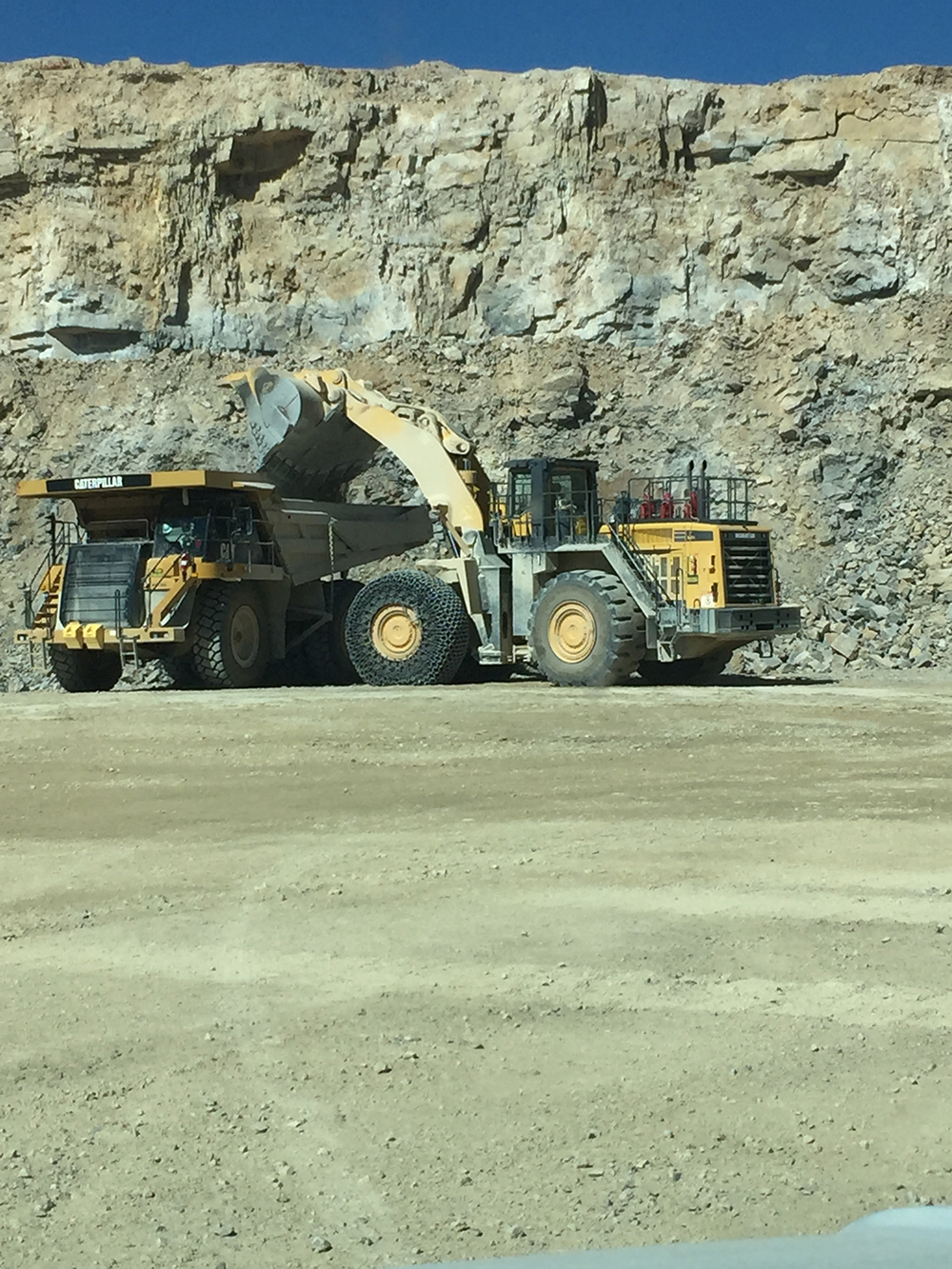 Large wheel loader working at a quarry